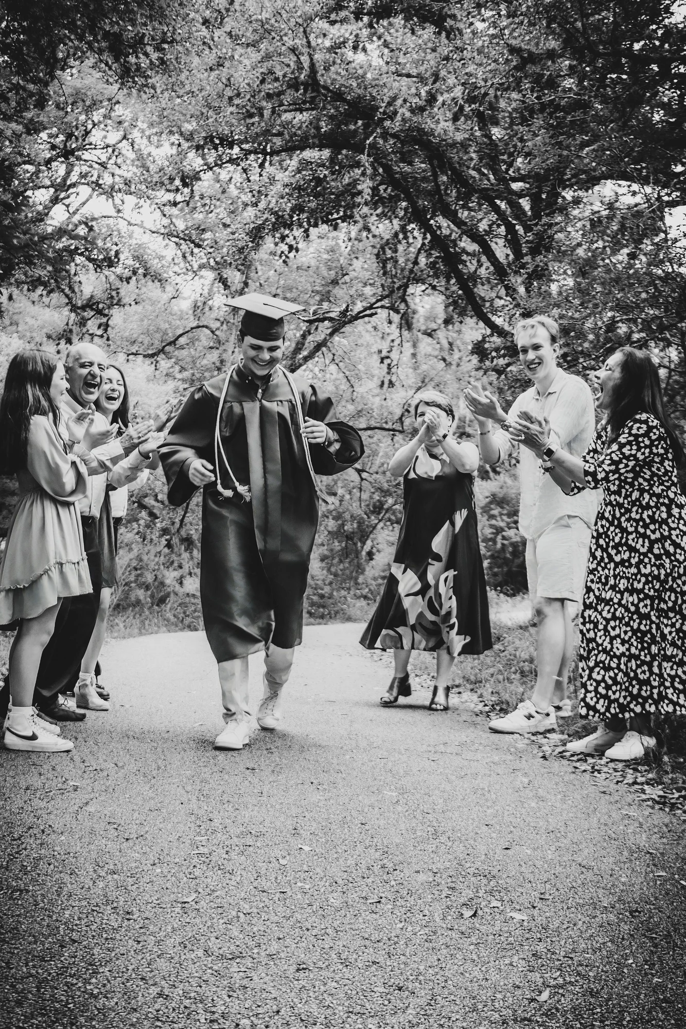 Senior graduation portrait photographed by Yelena outdoors